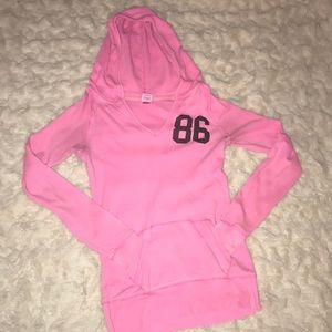 Pink long sleeved hooded shirt